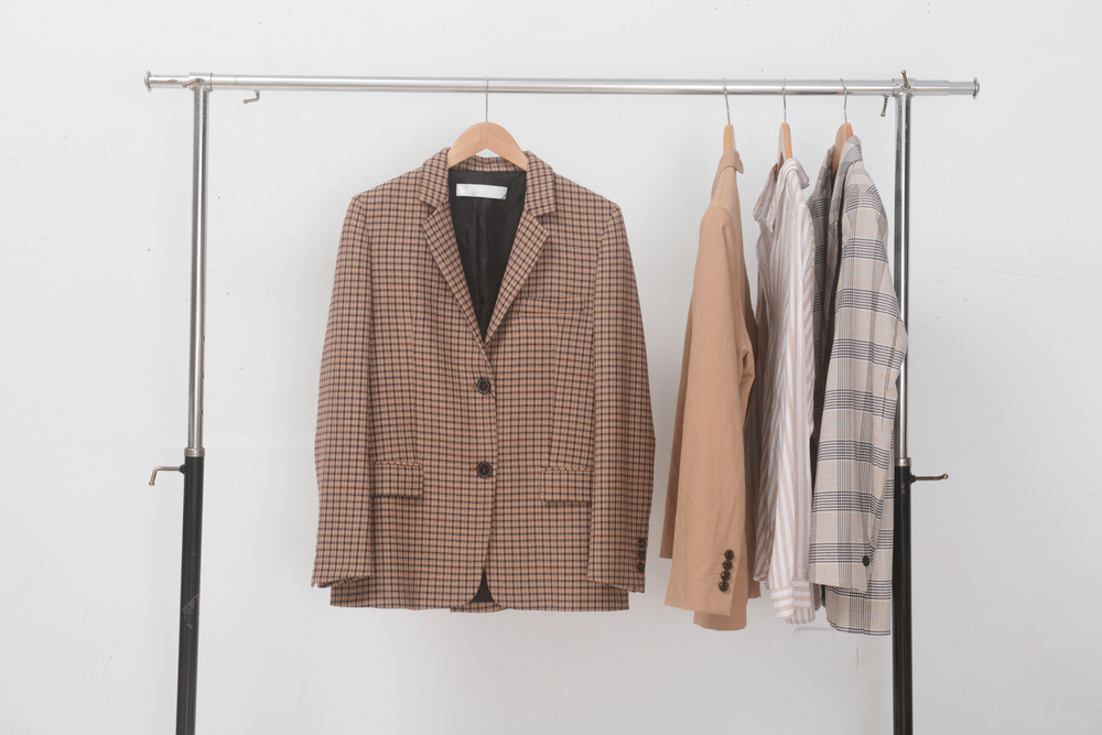 Oversized blazers hanging on stand