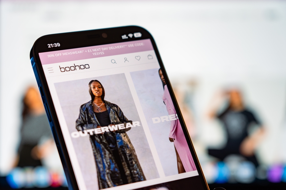 BooHoo Mobile Website with laptop website in the background